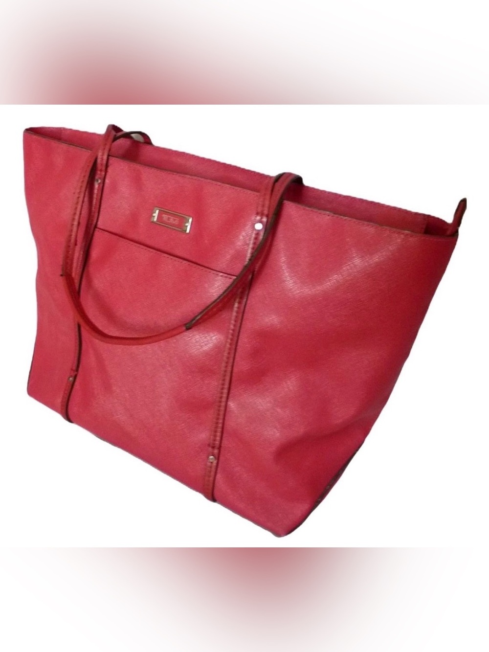 Tumi Villa Q Tote crafted from red saffiano leather features structured design